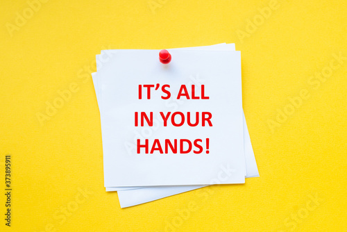 It's all in your hands. Motivational slogan on white sticker with yellow background. Motivational Business.