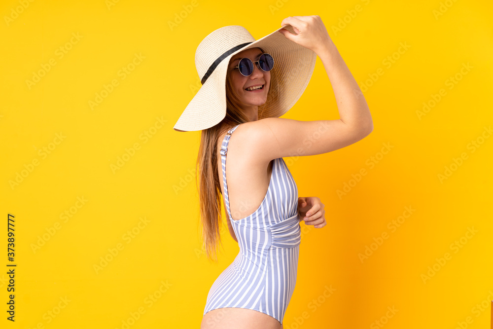 Teenager Ukrainian girl happy in swimsuit in summer holidays Teenager Ukrainian girl happy in swimsuit in summer holidays