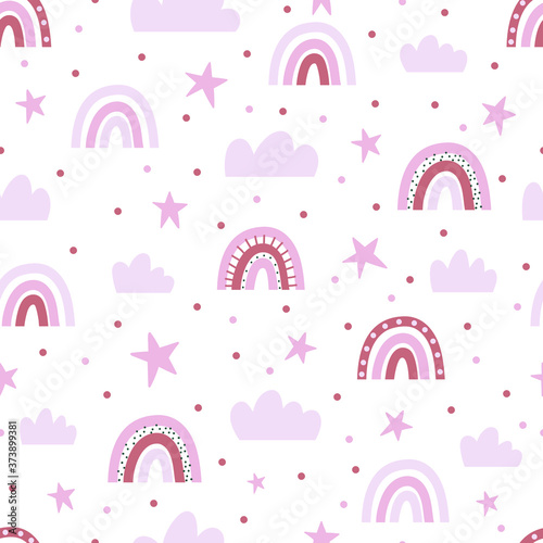 Seamless pattern with pink clouds, stars and rainbows.