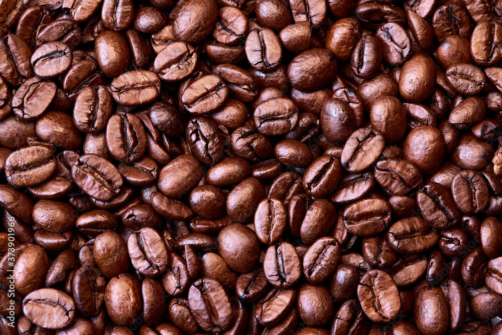 Aromatic roasted coffee beans in the vicinity Aromatic roasted coffee beans in the vicinity
