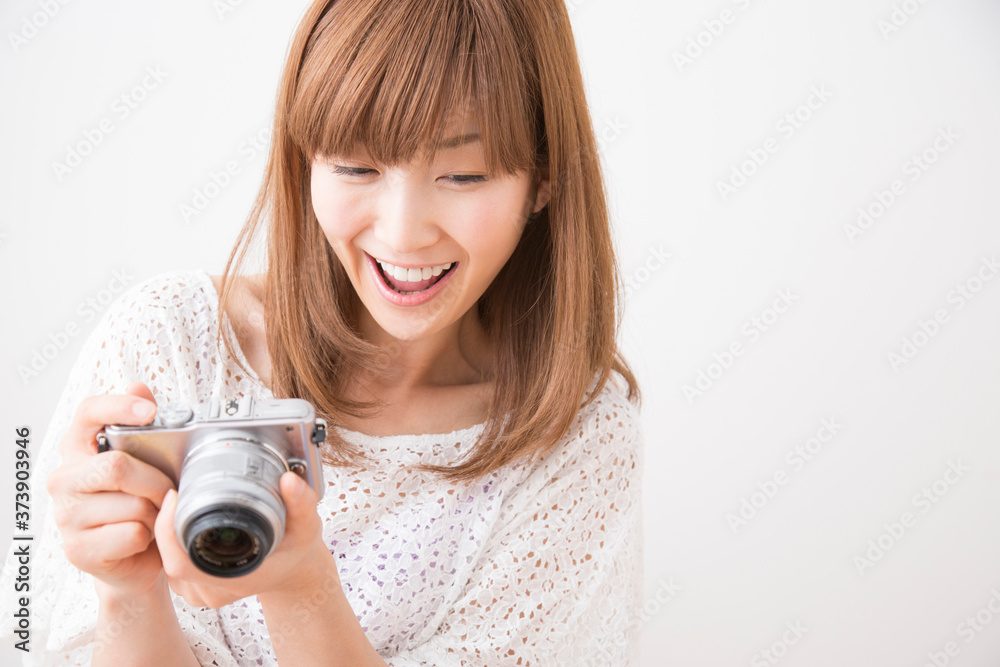 Fototapeta premium 女性カメラマン