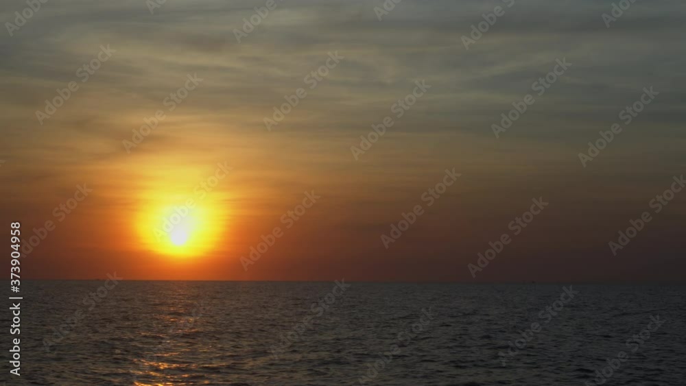 Beautiful sunset on sea and cloud sky, summer tropical, ocean and sunrise in the morning, river or lake at evening in vacation, seascape and landscape, water wave, nature background, holiday concept. Beautiful sunset on sea and cloud sky, summer tropical, ocean and sunrise in the morning, river or lake at evening in vacation, seascape and landscape, water wave, nature background, holiday concept.