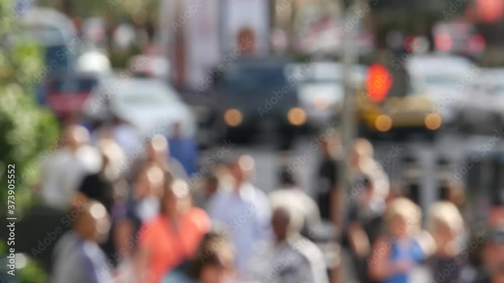 Defocused crowd of people, road intersection crosswalk on The Strip of Las Vegas, USA. Anonymous blurred pedestrians on walkway in crowded urban downtown. Unrecognizable american citizens in sin city. Defocused crowd of people, road intersection crosswalk on The Strip of Las Vegas, USA. Anonymous blurred pedestrians on walkway in crowded urban downtown. Unrecognizable american citizens in sin city.
