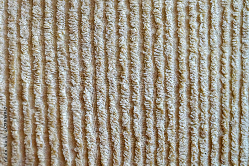 texture of beige ribbed material for background