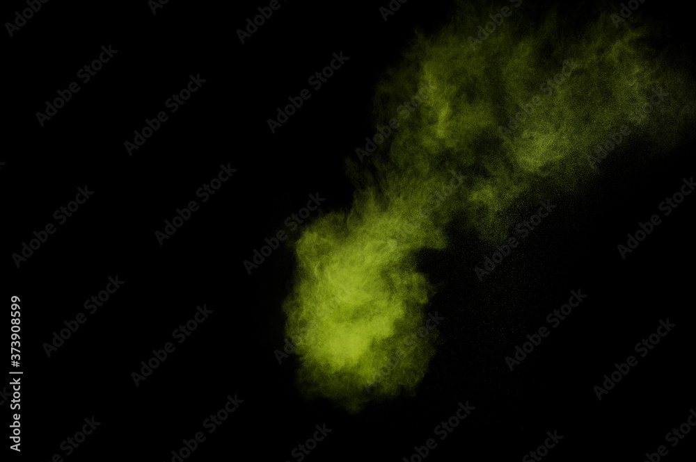 Light green powder explosion on black background. Colored powder cloud. Colorful dust explode. Paint Holi. Light green powder explosion on black background. Colored powder cloud. Colorful dust explode. Paint Holi.
