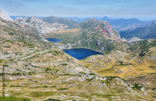 Views of Saliencia lakes in Somiedo natural park on the way to Calabazosa peak, Spain photo