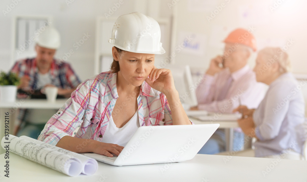Group of business people, architects working in office Group of business people, architects working in office