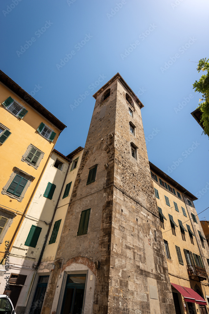 Torre del Campano (tower of the bell, Italian) , XII Century, medieval bell tower in Pisa downtown, in Via Domenico Cavalca. Tuscany, Italy, Europe