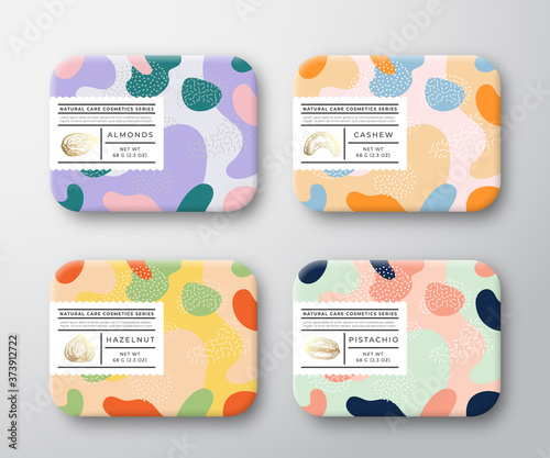 Bath Care Cosmetics Boxes Set. Vector Wrapped Containers Label Cover Collection. Packaging with Hand Drawn Almond, Hazelnut, Cashew and Pistachio Nuts. Abstract Camo Background Pattern Layout.