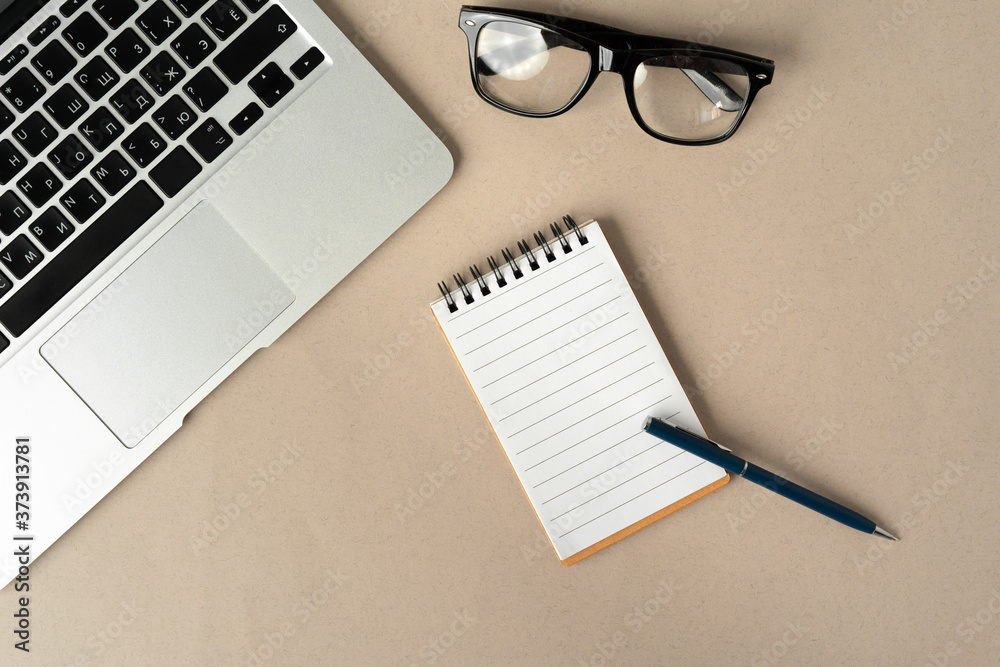 Open laptop with blank notebook, view from above. Workplace concept Open laptop with blank notebook, view from above. Workplace concept