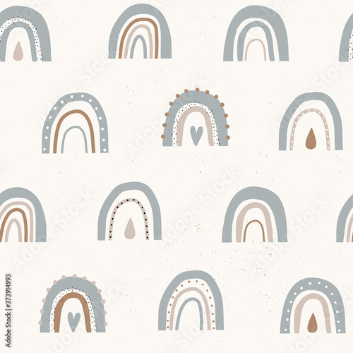 Vector Seamless childish pattern with hand drawn rainbows and hearts. Creative scandinavian kids texture for fabric, wallpaper, apparel.