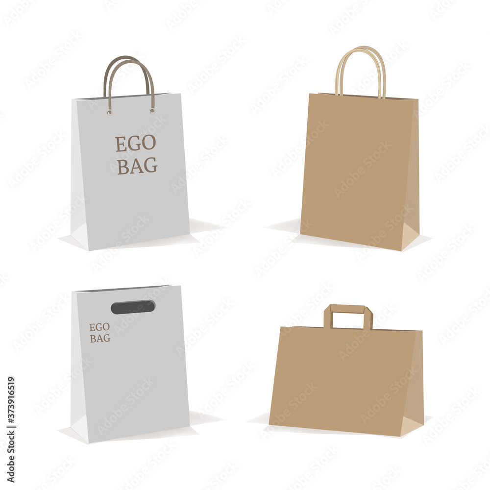 Paper bags on white isolated background. A set of eco bags made of paper and cardboard with cord handles. Eco-friendly store packaging, retail packaging. Paper bags on white isolated background. A set of eco bags made of paper and cardboard with cord handles. Eco-friendly store packaging, retail packaging.
