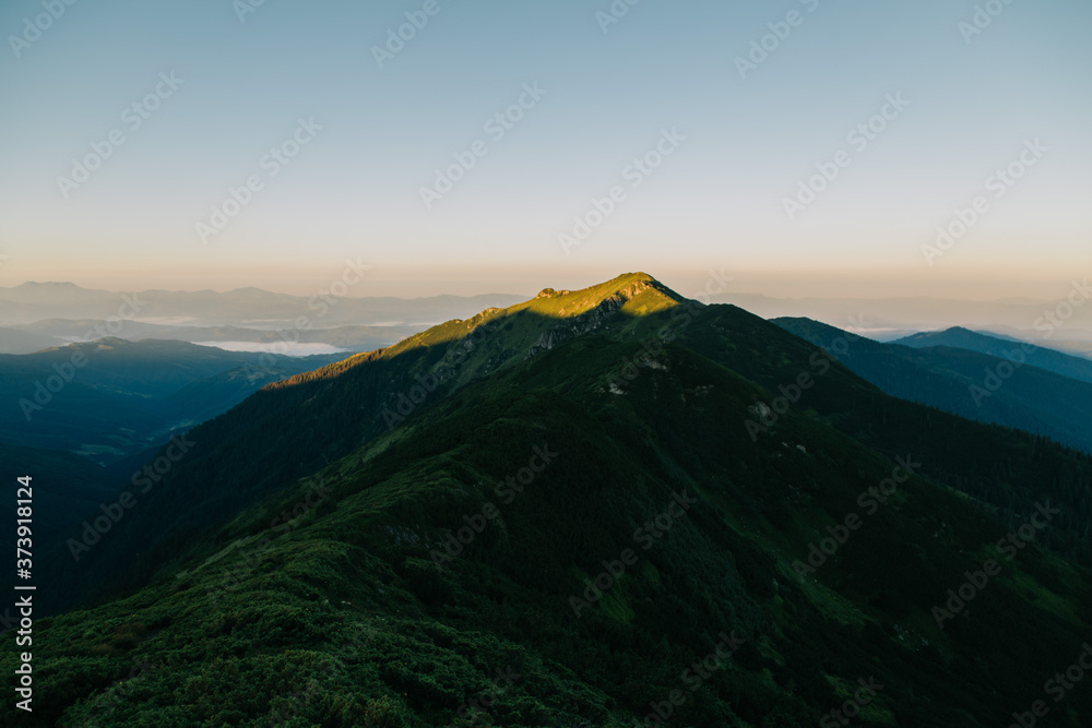 Amazing sunset in the wild ukrainian ridge Marmarosy, near Romania Amazing sunset in the wild ukrainian ridge Marmarosy, near Romania