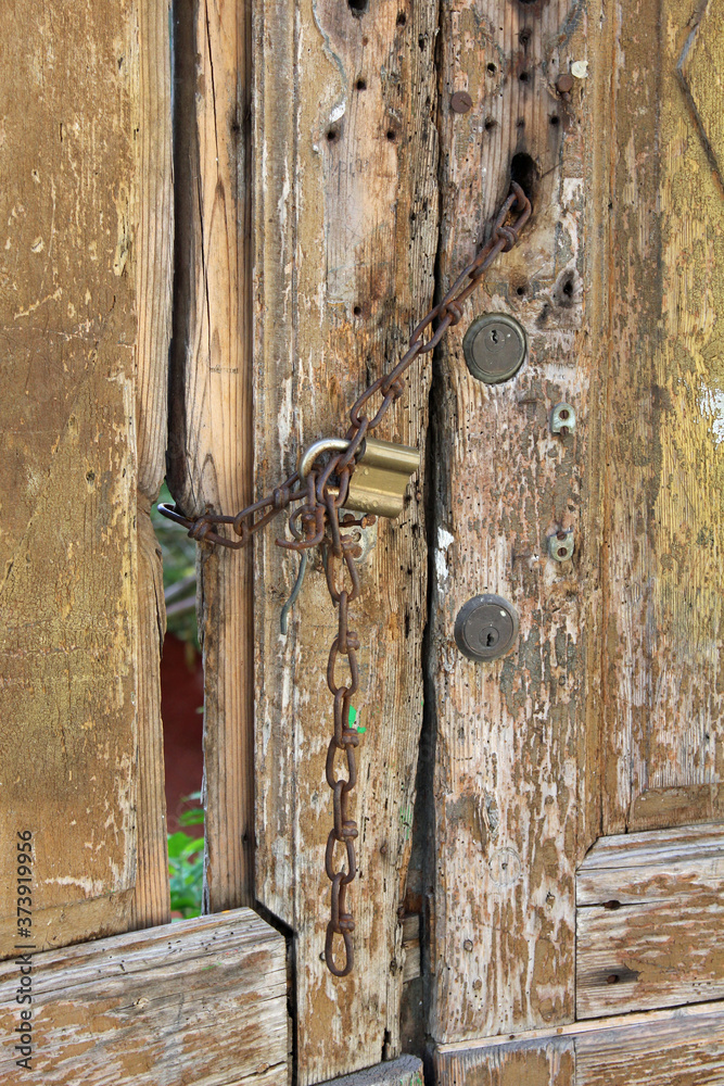 Security on on old worn out door Security on on old worn out door