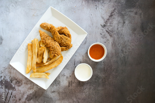 Chicken Strips and French F...