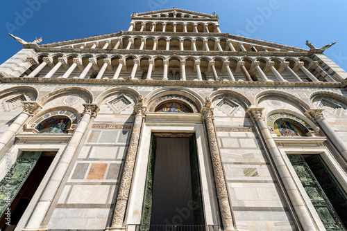 Facade of the Pisa Cathedral (Duomo di Santa Maria Assunta), in Pisan Romanesque style, Piazza or Campo dei Miracoli (Square of Miracles). Tuscany, Italy, Europe