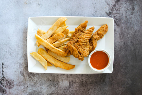 Chicken Strips and French F...