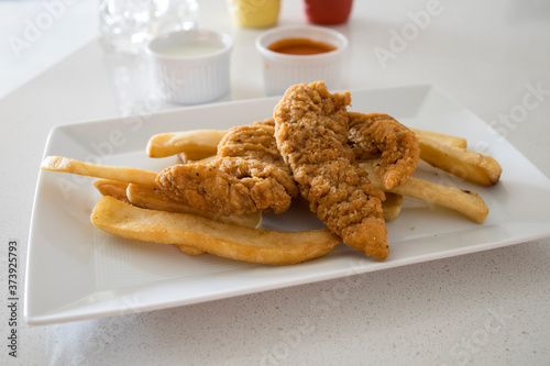 Chicken Strips and French F...