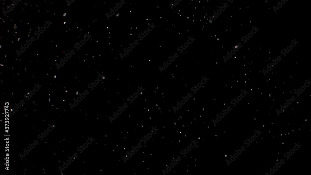Dust particles on black background. 3D effect with snow glare and flare sparkle Dust particles on black background. 3D effect with snow glare and flare sparkle