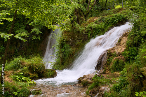 Fototapeta Naklejka Na Ścianę i Meble -  Gostilije waterfall falling from rock in Zlatibor resort of Western Serbia