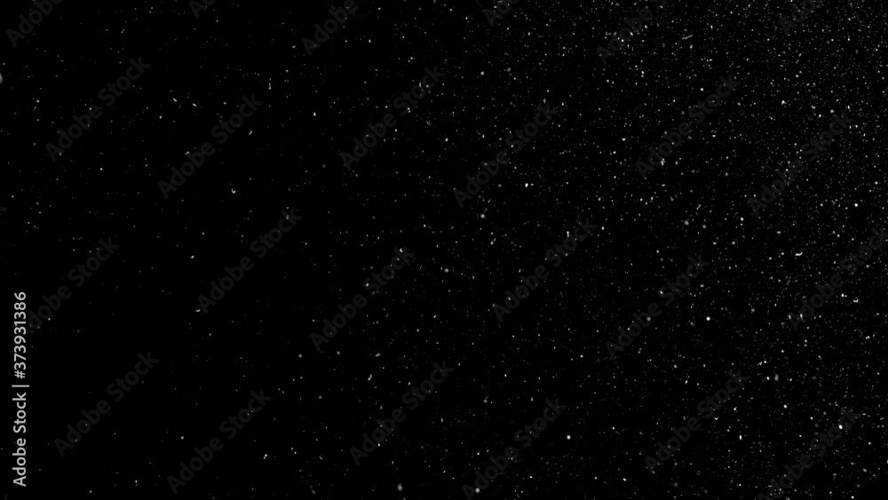 Dust particles on black background. 3D effect with snow glare and flare sparkle Dust particles on black background. 3D effect with snow glare and flare sparkle