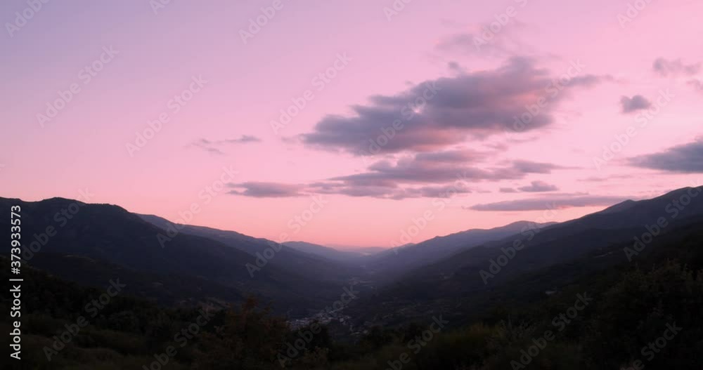 Timelapse during a sunset of the clouds between the mountains in the Valle del Jerte, Cáceres, Spain. Dramatic skies and nature
Timelapse during a sunset of the clouds between the mountains in the Valle del Jerte, Cáceres, Spain. Dramatic skies and nature