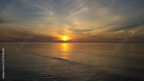 sunset at the beach © weera