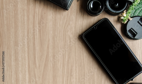 mobile phone on a wooden table