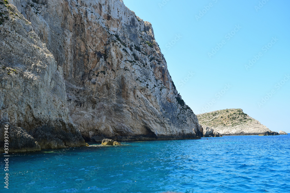 view of the blue Mediterranean sea and cliffs