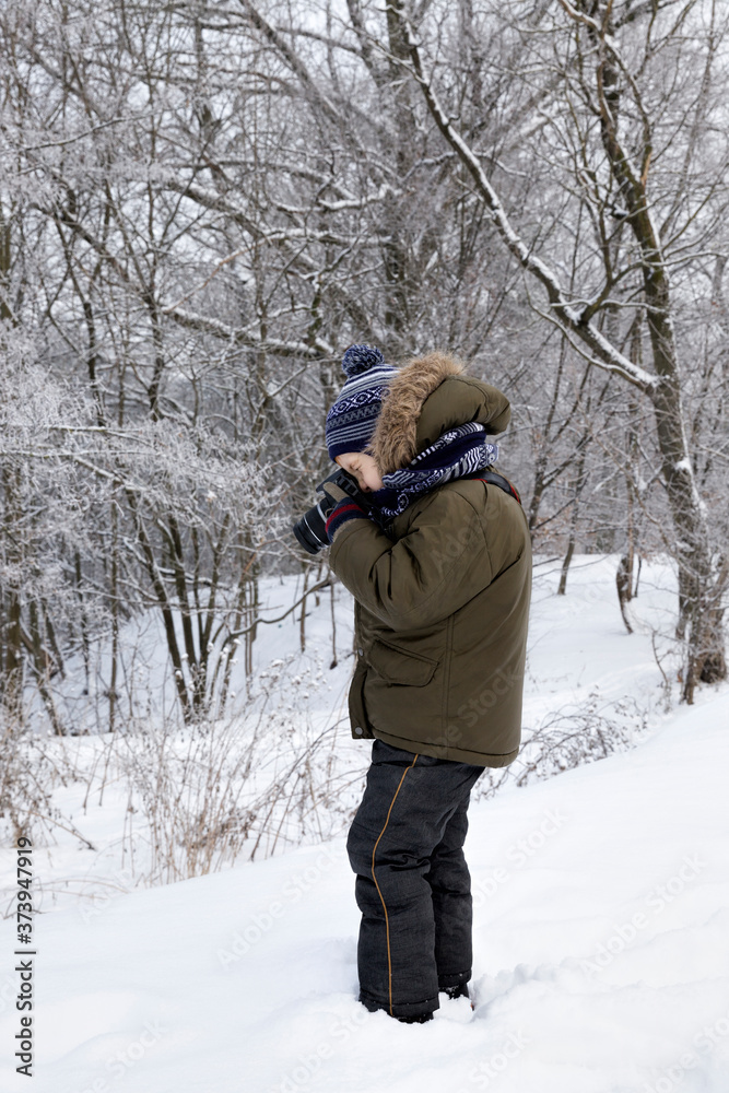 a boy takes pictures