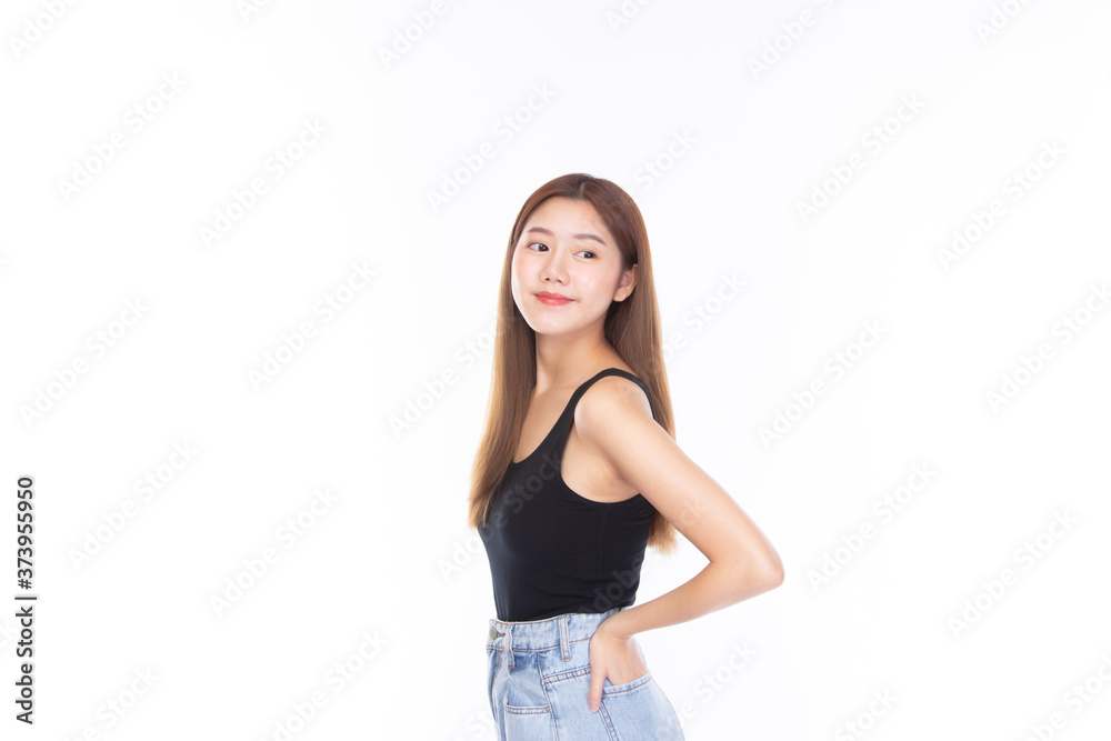 Fashion of a beautiful young asian woman in a pretty black vest and blue jeans feeling smile and happy. isolated on white background. Summer fashion beauty and style. Fashion of a beautiful young asian woman in a pretty black vest and blue jeans feeling smile and happy. isolated on white background. Summer fashion beauty and style.