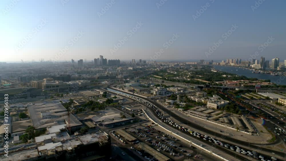 Panning right all the way from Oud Metha onto a view of Al Maktoum Bridge and beyond the Dubai Creek, Aerial, 6-axis stabilized gimbal, Shotover F1, 8K, parallax. Panning right all the way from Oud Metha onto a view of Al Maktoum Bridge and beyond the Dubai Creek, Aerial, 6-axis stabilized gimbal, Shotover F1, 8K, parallax.