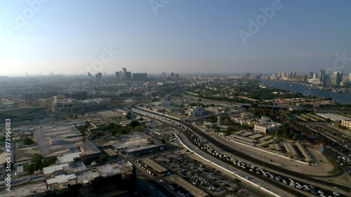Panning right all the way from Oud Metha onto a view of Al Maktoum Bridge and beyond the Dubai Creek, Aerial, 6-axis stabilized gimbal, Shotover F1, 8K, parallax. photo