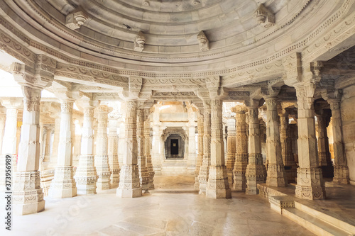 Ranakpur Jain temple in Rajasthan, India. The temple built using white marble, with 1444 pillars, 80 domes and 426 columns all intricately carved and unique. This is one of  the  largest Jain temple.
