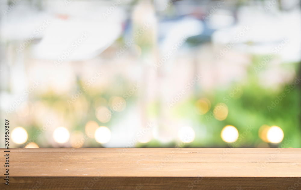 Wooden table on defocuced window with curtain background Wooden table on defocuced window with curtain background