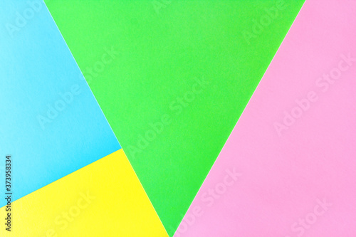 geometric flat lay pastel composition of bright colored paper