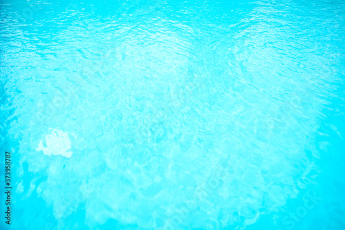 Surface of blue swimming pool. Background of water in swimming pool