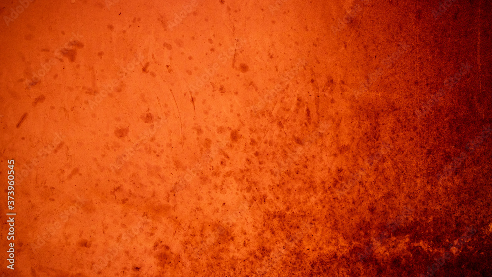 Abstract glowing red grunge background with black stain overlay, Horror and halloween concept design. Abstract glowing red grunge background with black stain overlay, Horror and halloween concept design.