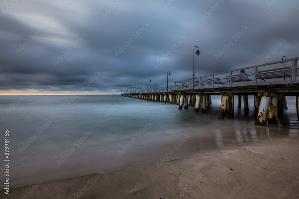 stormy sunrise over the baltic sea in Gdynia Orlowo, Poland