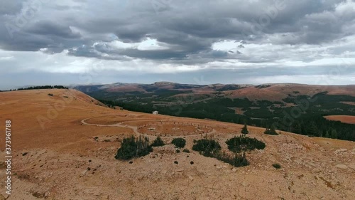 Drone circling over the plateau with ruins of Bighorn Medicine Wheel in Wyoming, USA