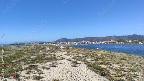 Northern Litoral Natural Park in Ofir, Fao, Esposende, Portugal. The two sides of Restinga de Ofir. One facing the ocean, the other the estuary of Cávado River. photo