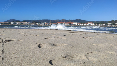 Wallpaper Mural Waves of water of the river and the sea meet each other during high tide and low tide. Whirlpools of the Cavado River in Esposende, Portugal. Torontodigital.ca