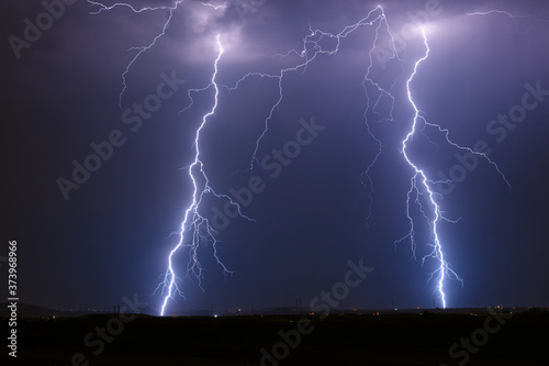 Twin lightning bolt strikes in a thunderstorm