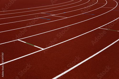 Red stadium running tracks closeup