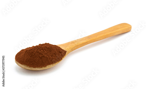 Wooden spoon with coffe powder