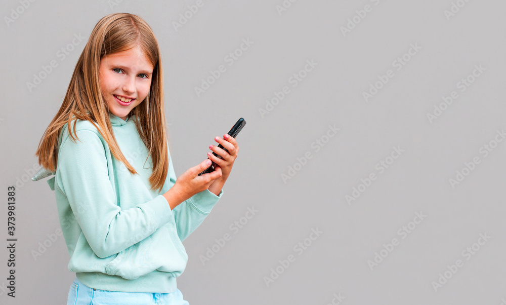 Crazy cool stylish trendy nice cute cheerful adorable lovely attractive blone girl isolated over gray background Crazy cool stylish trendy nice cute cheerful adorable lovely attractive blone girl isolated over gray background