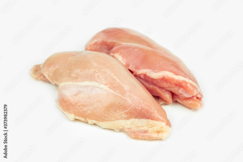 piece of chicken breast, raw filet meat, isolated on white piece of chicken breast, raw filet meat, isolated on white