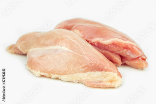 piece of chicken breast, raw filet meat, isolated on white