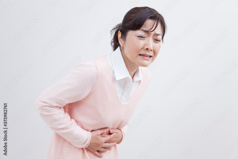 腹痛のミドル女性