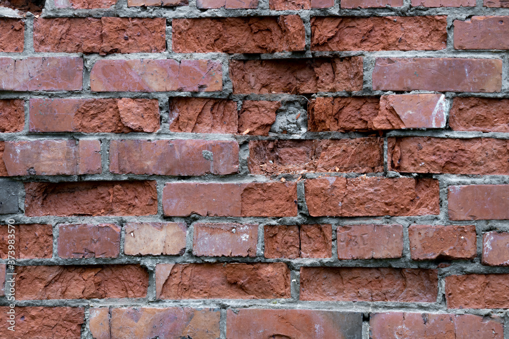 Wall of red bricks. Texture or background of bricks. Wall of red bricks. Texture or background of bricks.